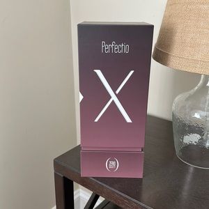 Perfection X LED infrared light and heat therapy beauty device.